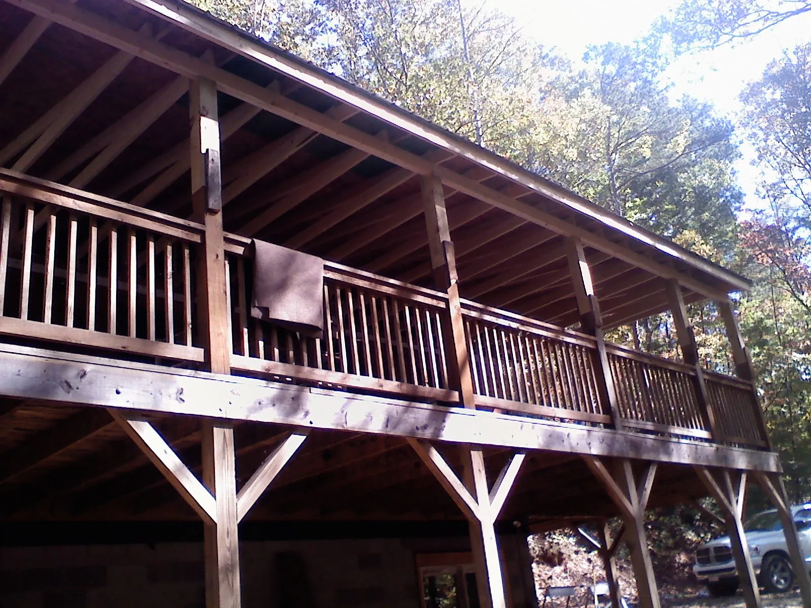 Timber framing under a new elevated porch and deck — Roof Leak Repair in Mountain Dale by Roofing Brothers
